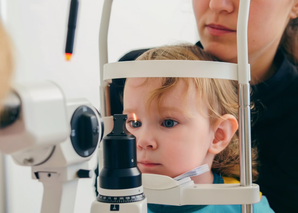 Child having eyes examined