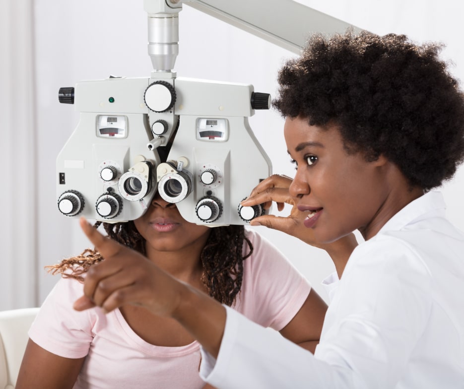 Doctor conducting an eye test with the patient